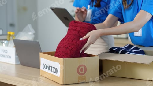 Preview: Volunteers organizing donation items for community support
