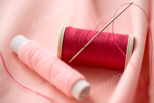 Preview: red thread spool on cloth