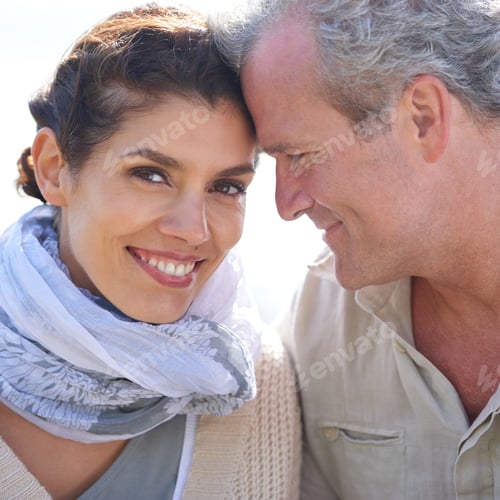 Romantic Senior Couple Smiling Together in Natural Light
