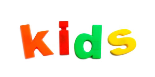 Preview: Word KIDS of magnetic letters on white background, top view