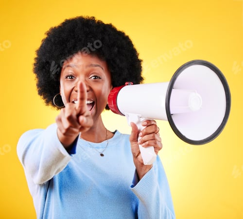 Preview: Pointing, happy woman and loudspeaker or megaphone in studio for voice or announcement. African per