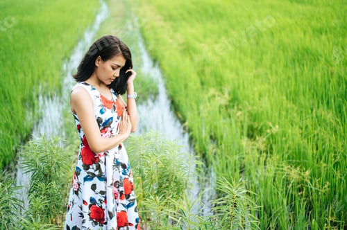Preview: The woman stood strained and her hand touched the face in the meadow.