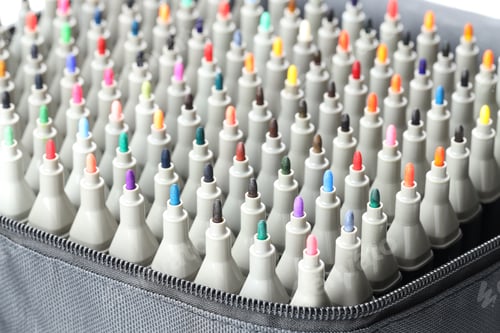 Preview: Many colorful markers in bag, closeup. Art supplies