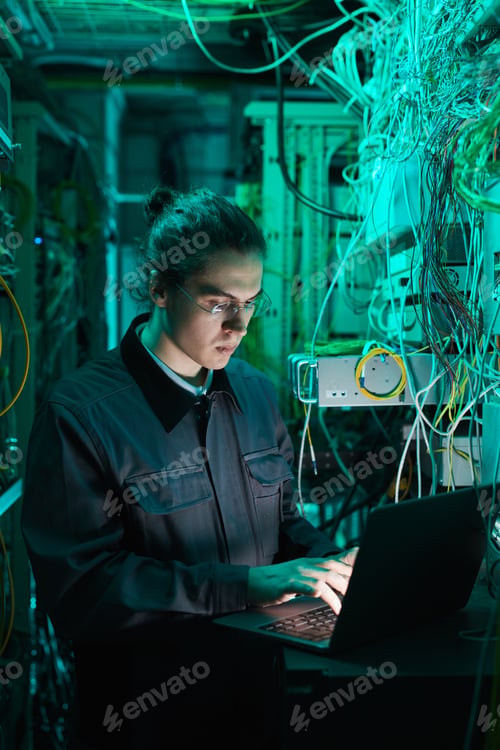 Preview: Technician Working in Server Room