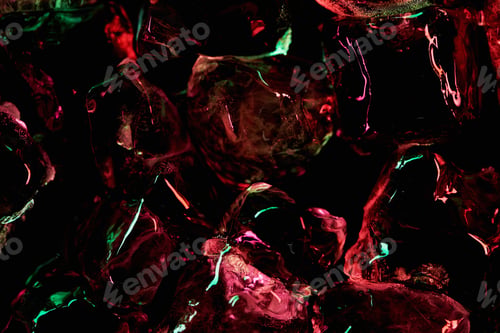 Preview: top view of ice cubes with red and green light isolated on black