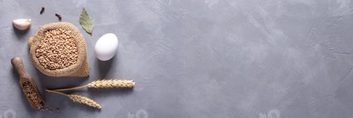 Preview: Bakery ingredients for homemade bread baking on table. Wheat grain food as panoramic top view