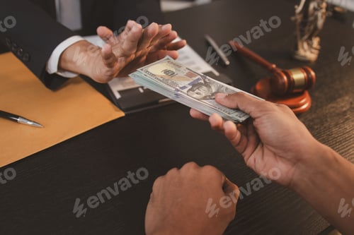 Preview: A professional lawyer discussing legal matters with a client in an office