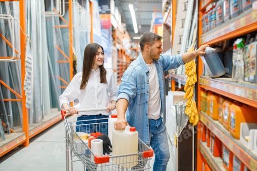 Preview: Couple with a cart choosing building materials
