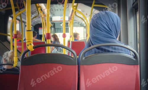 Preview: Muslim women in scarf in a Bus