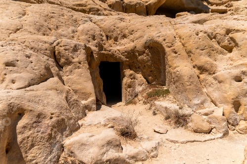 Preview: Exploring ancient caves near Matala in Crete, Greece during a sunny day