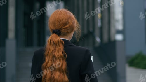 Preview: Woman with Auburn Hair in Black Jacket Outdoors