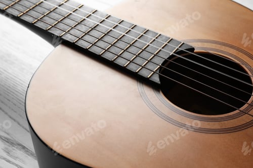 Preview: Beautiful classical guitar, view on body with strings. Musical instrument