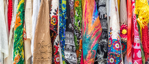 Preview: Closeup shot of colorful beach scarfs in a market