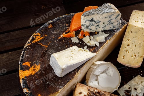Preview: A Selection of Artisanal Cheeses Arranged Beautifully on a Rustic Serving Board for Sharing