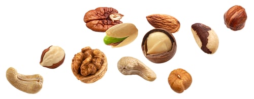 Preview: Flying nuts isolated on white background