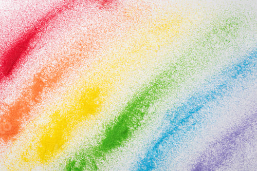 Preview: Rainbow sand flag signifies unity during LGBT history month. Top view displays sand art against