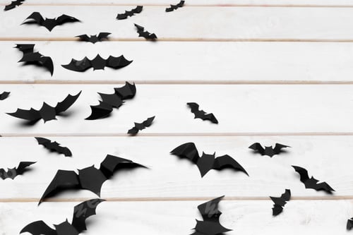 Preview: halloween and decoration concept - paper bats flying