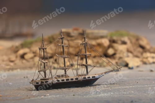 Preview: Closeup shot of a small wooden boat on the ground