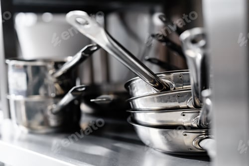 Preview: Kitchen utensils on work surface in professional kitchen