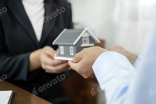 Preview: The real estate agent gives the house to a new owner's client after completing the signing