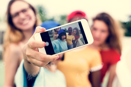 Preview: Group of diverse women taking selfie together