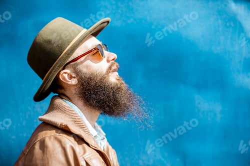 Preview: Portrait of a stylish man on the colorful background