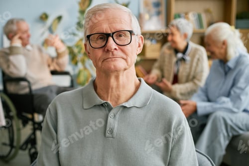 Preview: Portrait of Elderly Man Wearing Glasses in Senior Center