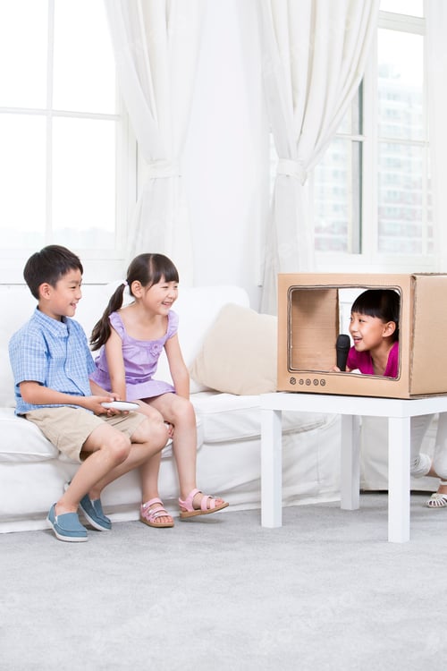 Preview: Chidren and a handmade toy TV