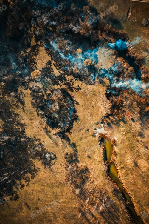 Preview: Aerial View Of Dry Grass Burns During Drought And Hot Weather. Wild Open Fire Destroys Grass