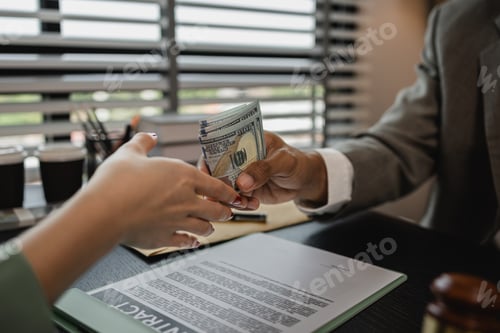 Preview: lawyer and client shake hands after receiving bribes for illegal deals