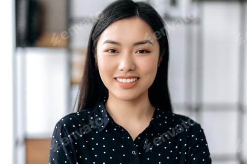 Preview: Close-up portrait of pretty happy confident asian young woman, smiling at camera