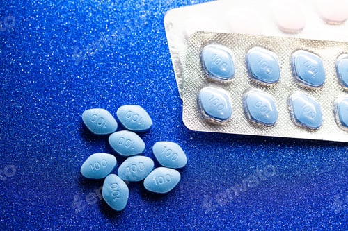 Preview: Pill for men's health and Valentine's Day background.