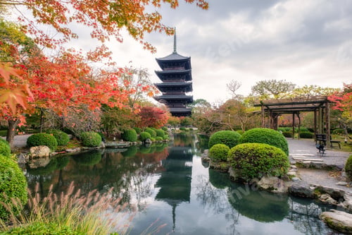 Preview: Ancient wood pagoda in Toji temple of unesco world heritage site in autumn garden at Kyoto