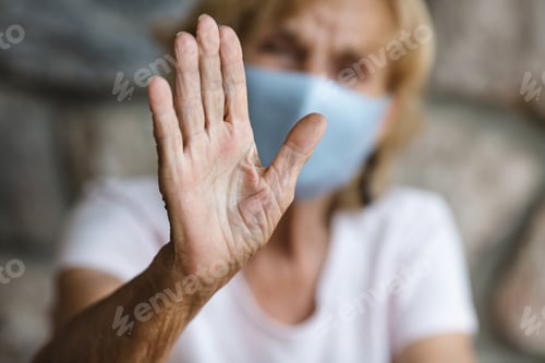 Preview: Elderly woman with a face mask
