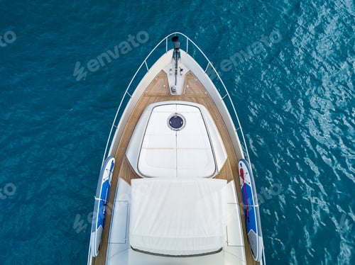 Preview: Aerial shot of a yacht sailing on the sea - great fro background or a blog