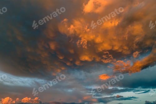 Preview: Cumulonimbus clouds forming before thunderstorm on evening sky.