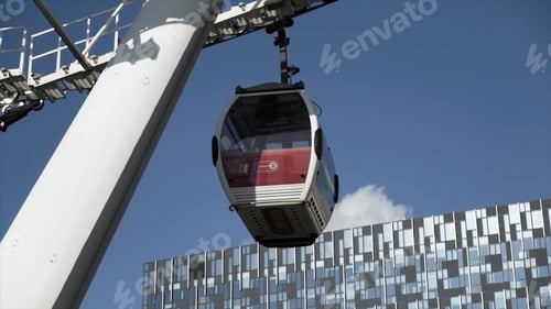 Preview: Emirates Air Line with a small cabin starting to move from the station, transportation and tourists