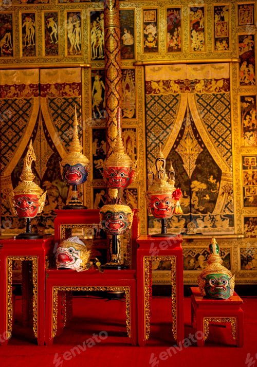 Preview: Vertical of beautiful ancient traditional Thai pattern Pantomime or Khon masks are set up on shelf
