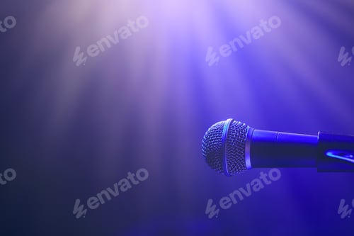 Preview: Microphone on stage against spotlights
