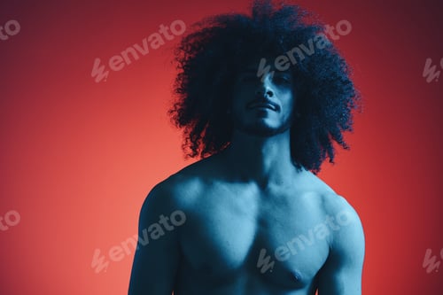 Preview: Portrait of fashion man with curly hair on red background with stylish glasses, multinational