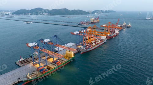 Preview: Crane loading box container to cargo ship at commercial dock port. Shipyard Cargo Container