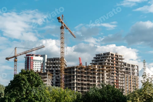 Preview: Construction site with high-rise cranes and unfinished buildings