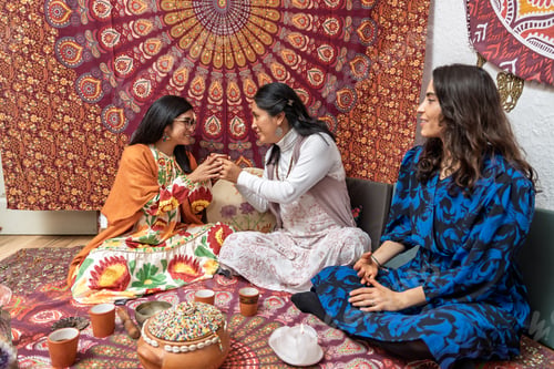 Preview: Women sharing organic cocoa during ceremony for alternative medicine and healthy living