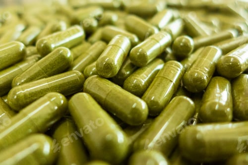 Preview: Closeup shot of medical pills in the production line