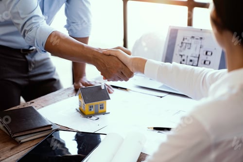 Preview: Architect shakes hands at meeting, meeting of two engineers or architects, shaking hands after discu