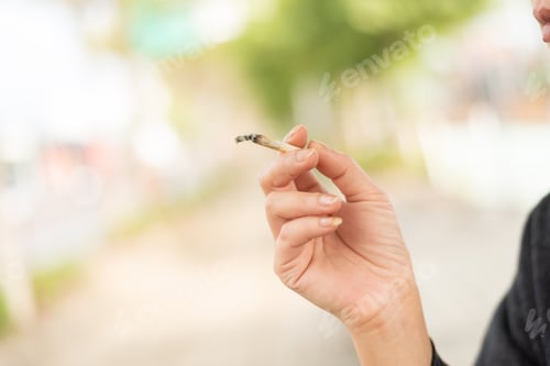 Preview: Woman Smoking And Hold A Cigarette With Copyspace