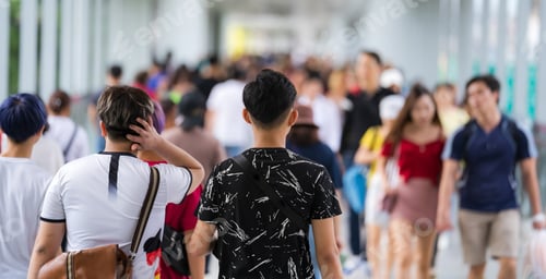 Preview: Crowd of anonymous people walking on the city street