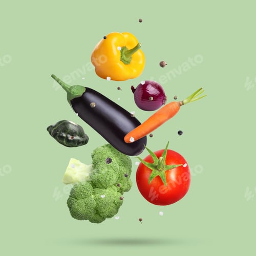 Preview: Fresh vegetables and spices in air on light green background