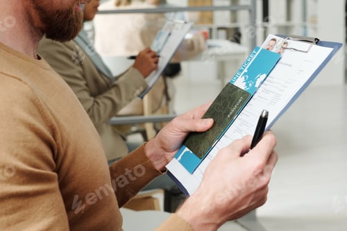 Preview: Man Waiting In Queue In Embassy