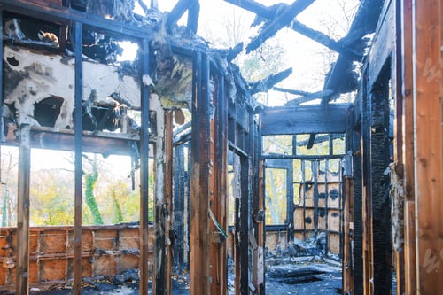 Preview: Burned wooden wall home after fire and burned everything in the area.